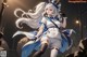 Anime girl with long white hair wearing a blue and white outfit.